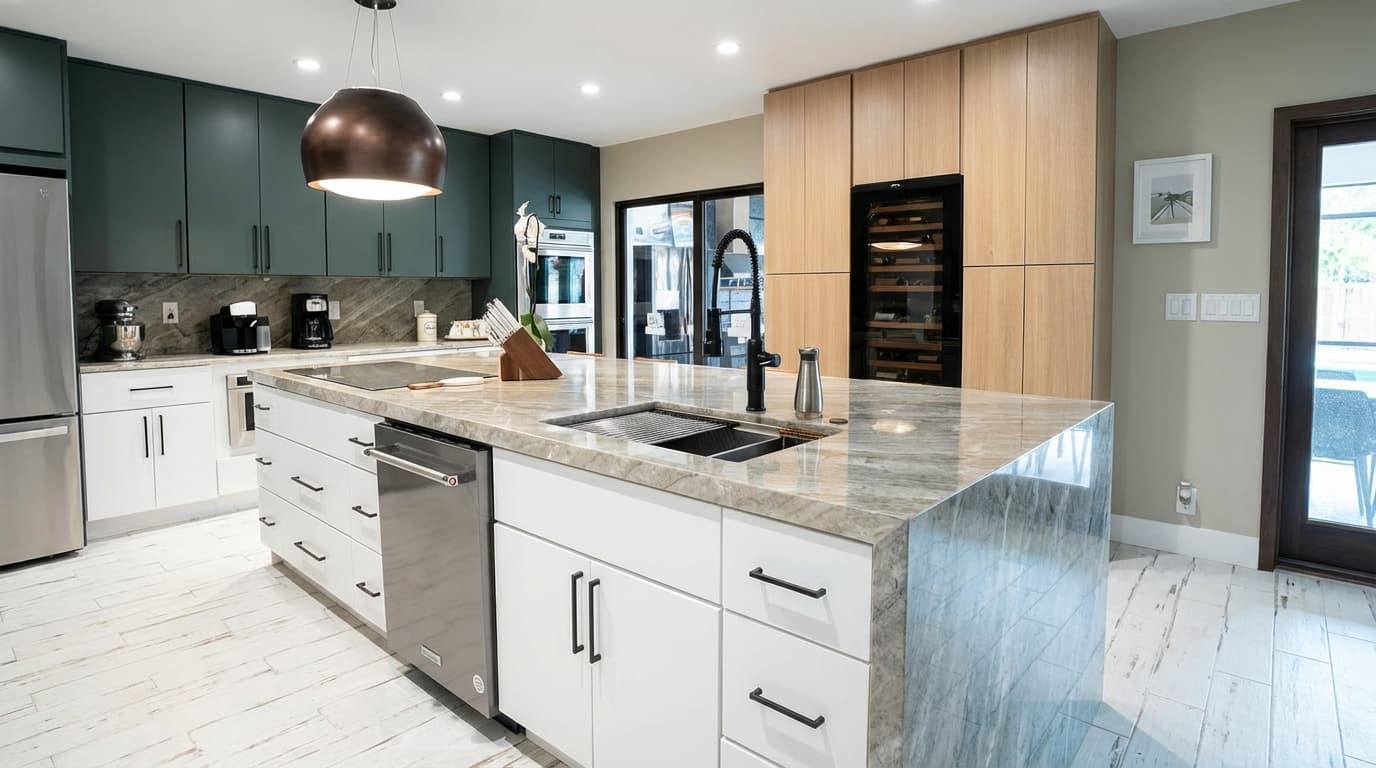 Sebastián's showroom — deep green cabinetry with marble waterfall island and butterfly wall installation